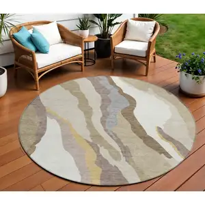 Photo of 8' Beige Brown And Gray Round Abstract Washable Indoor Outdoor Area Rug