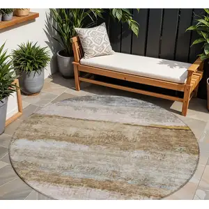 Photo of 8' Beige Brown And Gray Round Abstract Washable Indoor Outdoor Area Rug