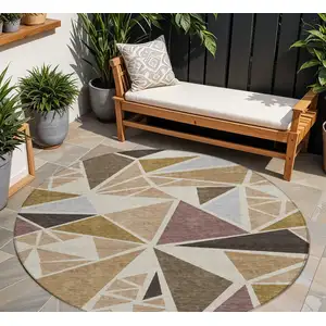 Photo of 8' Beige Brown And Gray Round Geometric Washable Indoor Outdoor Area Rug