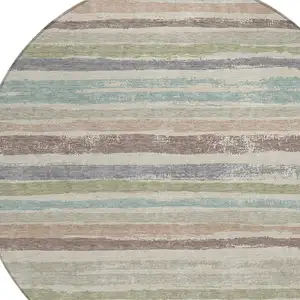 Photo of 8' Beige Brown And Gray Round Striped Washable Indoor Outdoor Area Rug