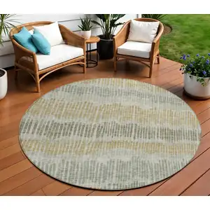Photo of 8' Beige Brown And Gray Round Striped Washable Indoor Outdoor Area Rug
