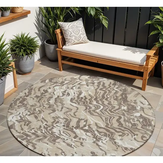 8' Beige Brown And Ivory Round Abstract Washable Indoor Outdoor Area Rug Photo 1