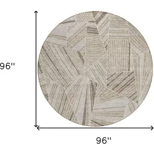 Photo of 8' Beige Brown And Ivory Round Geometric Washable Indoor Outdoor Area Rug