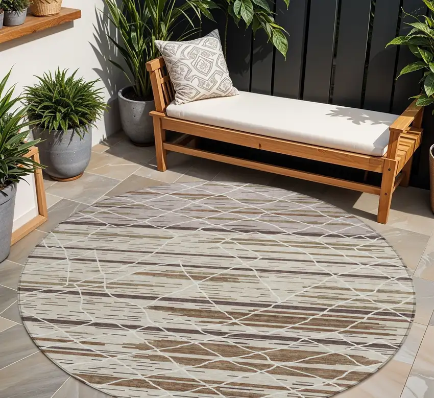 8' Beige Brown And Ivory Round Striped Washable Indoor Outdoor Area Rug Photo 1