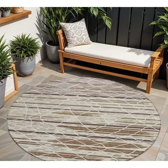 8' Beige Brown And Ivory Round Striped Washable Indoor Outdoor Area Rug Photo 1