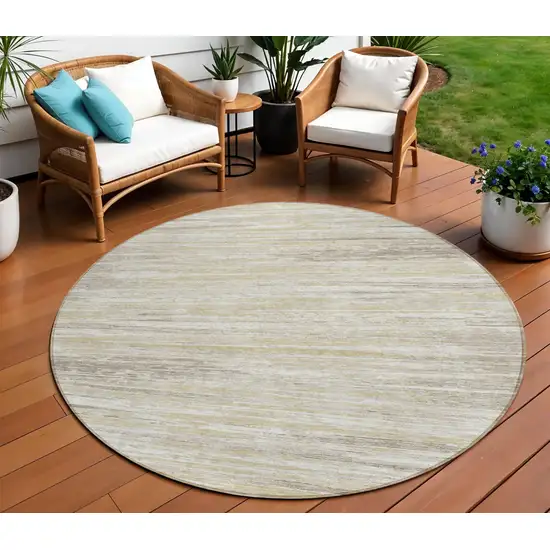 8' Beige Brown And Ivory Round Striped Washable Indoor Outdoor Area Rug Photo 1