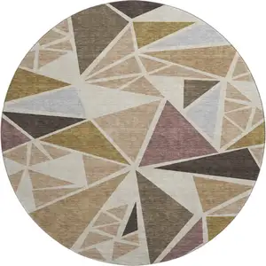 Photo of 8' Beige Brown And Mauve Geometric Washable Round Rug With UV Protection