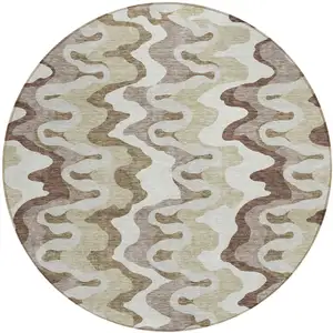 Photo of 8' Beige Brown And Taupe Round Abstract Washable Indoor Outdoor Area Rug
