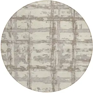 Photo of 8' Beige Brown And Taupe Round Striped Washable Indoor Outdoor Area Rug