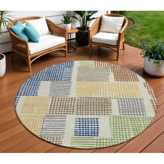 8' Beige Gold And Blue Round Geometric Washable Indoor Outdoor Area Rug Photo 2