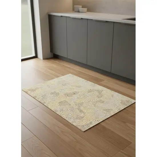 5' Beige Gold And Brown Geometric Washable Round Rug With UV Protection Photo 1