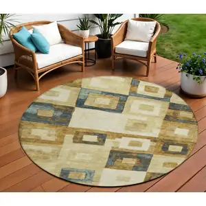Photo of 8' Beige Gold And Denim Blue Round Geometric Washable Indoor Outdoor Area Rug