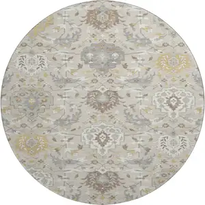 Photo of 8' Beige Gold And Gray Damask Washable Round Rug With UV Protection