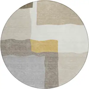 Photo of 8' Beige Gold And Gray Round Abstract Washable Indoor Outdoor Area Rug