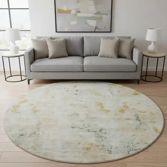 8' Beige Gold And Ivory Abstract Washable Round Rug With UV Protection Photo 2