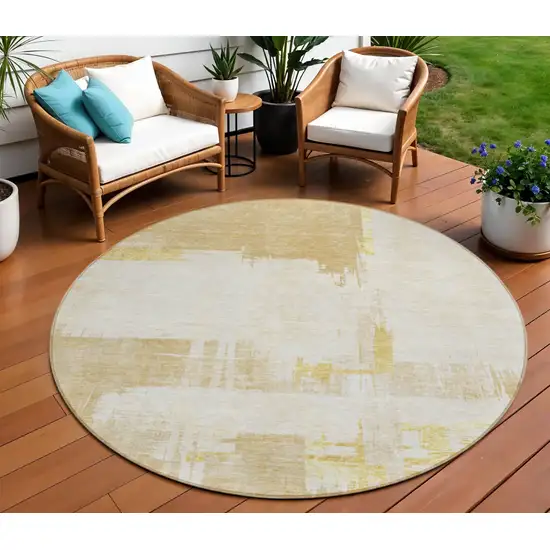 8' Beige Gold And Tan Round Abstract Washable Indoor Outdoor Area Rug Photo 1