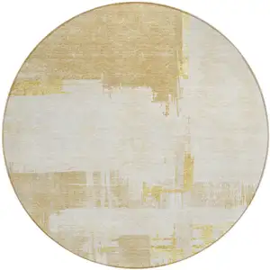 Photo of 8' Beige Gold And Tan Round Abstract Washable Indoor Outdoor Area Rug