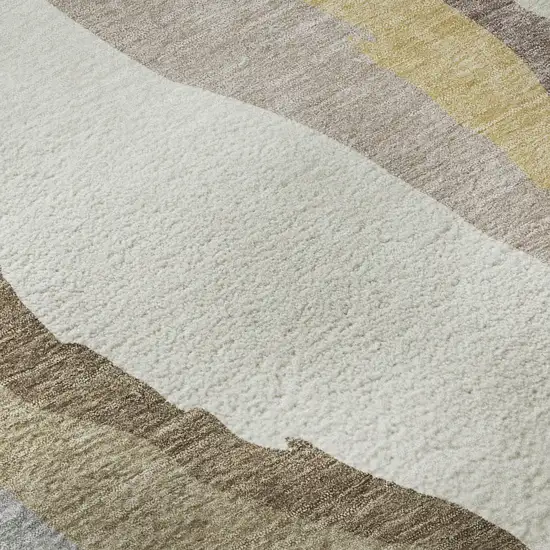 8' Beige Gold And Taupe Abstract Washable Round Rug With UV Protection Photo 8