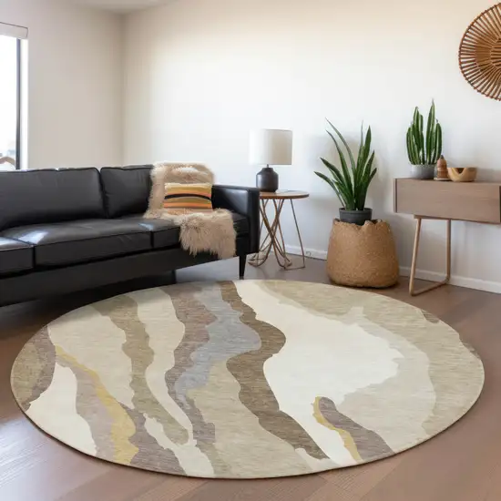 8' Beige Gold And Taupe Abstract Washable Round Rug With UV Protection Photo 4