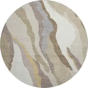 Photo of 8' Beige Gold And Taupe Abstract Washable Round Rug With UV Protection