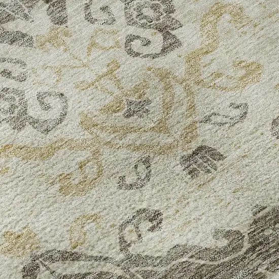 8' Beige Gold And Taupe Medallion Washable Round Rug With UV Protection Photo 9