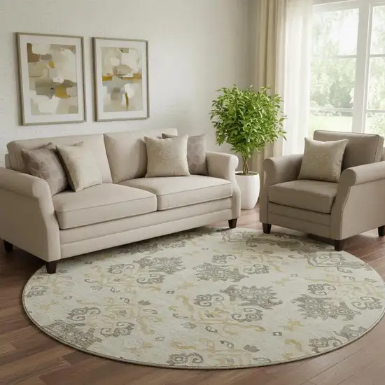 8' Beige Gold And Taupe Medallion Washable Round Rug With UV Protection Photo 1