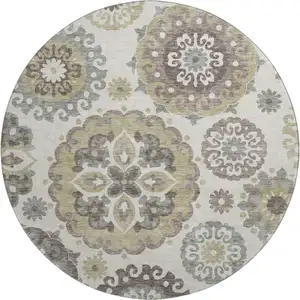 Photo of 8' Beige Gray And Brown Medallion Washable Round Rug With UV Protection