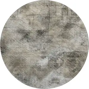 Photo of 8' Beige Gray And Ivory Abstract Washable Round Rug With UV Protection