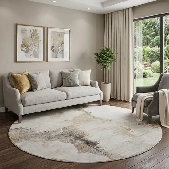 8' Beige Gray And Ivory Abstract Washable Round Rug With UV Protection Photo 1