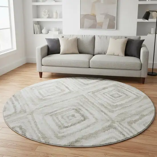 8' Beige Gray And Ivory Geometric Washable Round Rug With UV Protection Photo 2