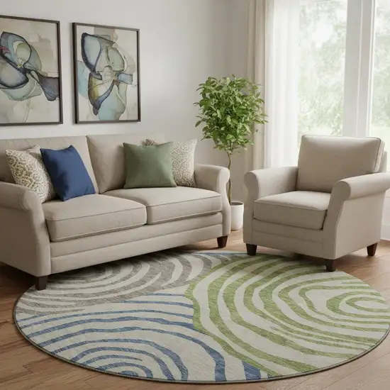 8' Beige Green And Blue Abstract Washable Round Rug With UV Protection Photo 1