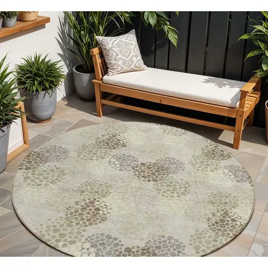 8' Beige Green And Ivory Round Polka Dot Washable Indoor Outdoor Area Rug Photo 1
