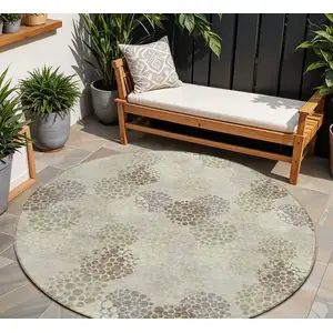 Photo of 8' Beige Green And Ivory Round Polka Dot Washable Indoor Outdoor Area Rug