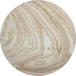 Photo of 8' Beige Green And Taupe Abstract Washable Round Rug With UV Protection