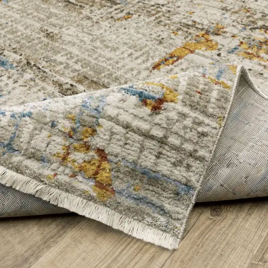 8' Beige Grey Brown Gold Red And Blue Abstract Power Loom Runner Rug With Fringe Photo 8