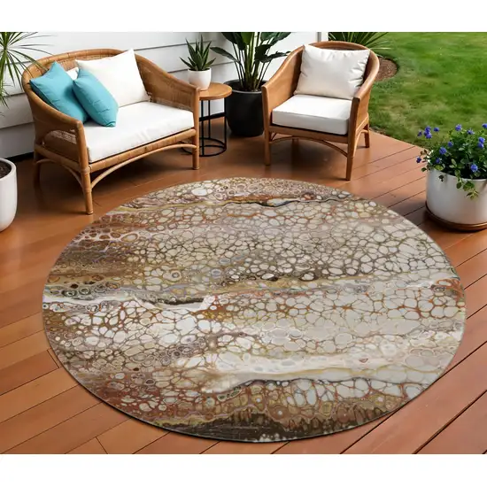 8' Beige Ivory And Black Round Abstract Washable Indoor Outdoor Area Rug Photo 1
