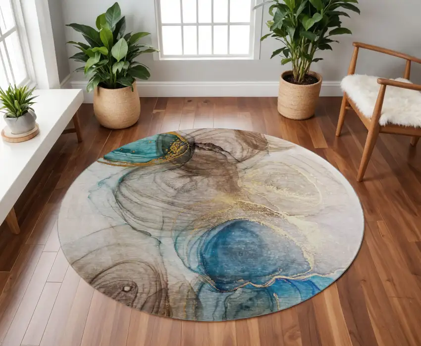 8' Beige Ivory And Blue Abstract Washable Round Rug With UV Protection Photo 2