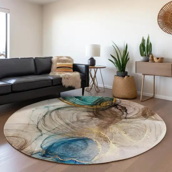 8' Beige Ivory And Blue Abstract Washable Round Rug With UV Protection Photo 5