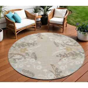 Photo of 8' Beige Ivory And Blue Round Floral Washable Indoor Outdoor Area Rug