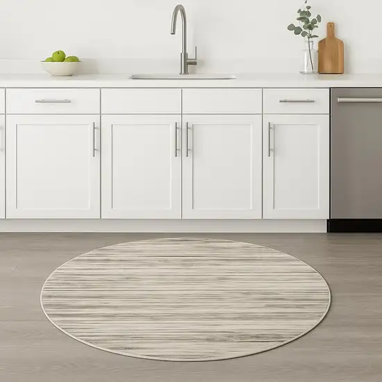 4' Beige Ivory And Brown Abstract Distressed Round Rug Photo 1