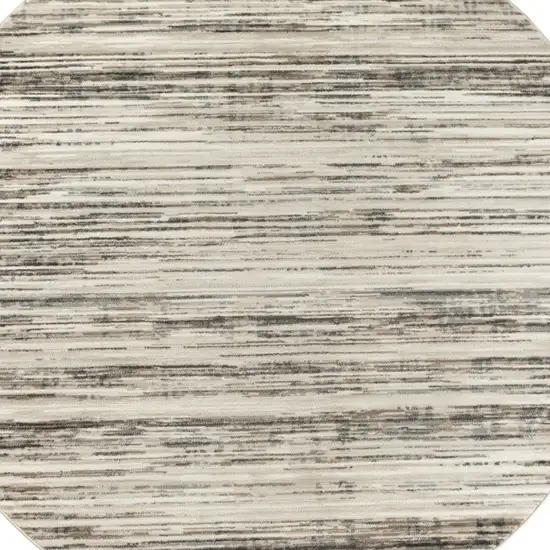 4' Beige Ivory And Brown Abstract Distressed Round Rug Photo 8