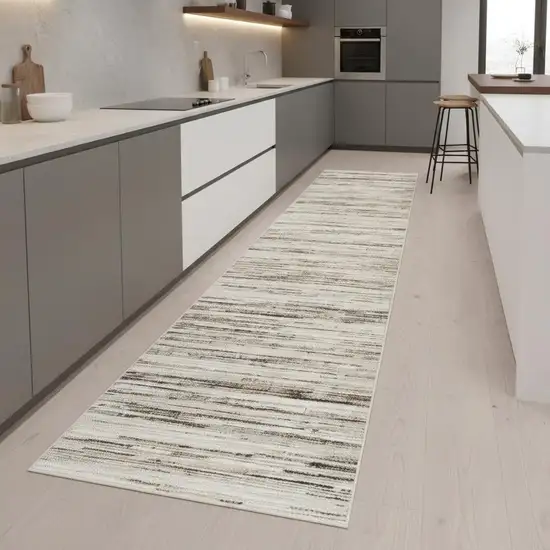 8' Beige Ivory And Brown Abstract Distressed Runner Rug Photo 1