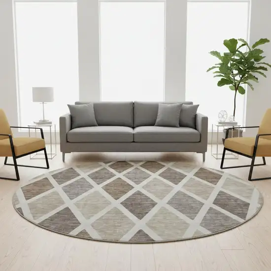 8' Beige Ivory And Brown Geometric Washable Round Rug With UV Protection Photo 2