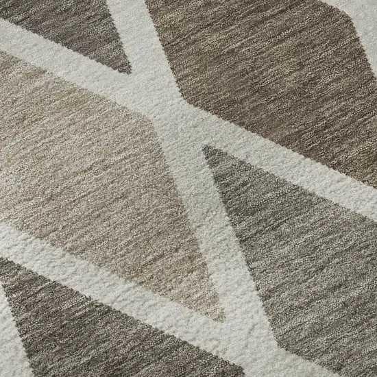 8' Beige Ivory And Brown Geometric Washable Round Rug With UV Protection Photo 9