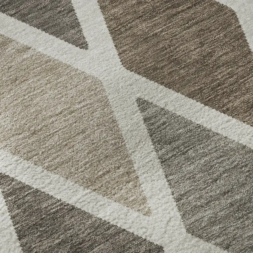 8' Beige Ivory And Brown Geometric Washable Round Rug With UV Protection Photo 9