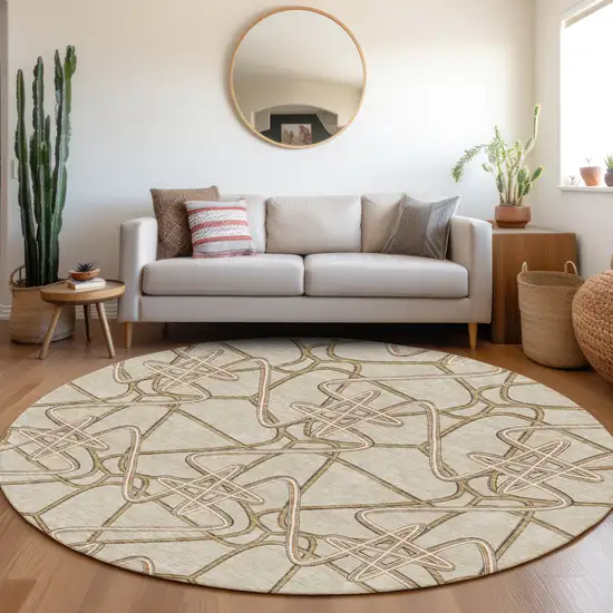 8' Beige Ivory And Brown Geometric Washable Round Rug With UV Protection Photo 3