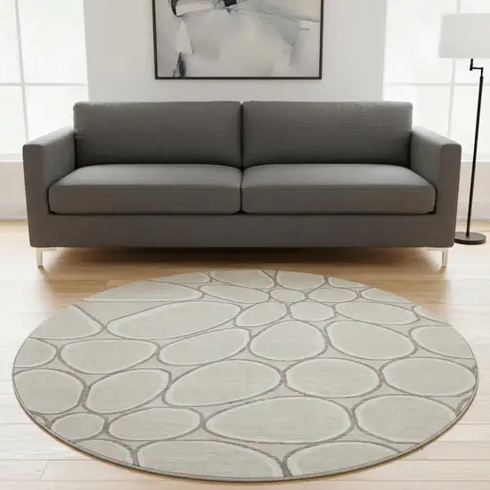 8' Beige Ivory And Brown Geometric Washable Round Rug With UV Protection Photo 2