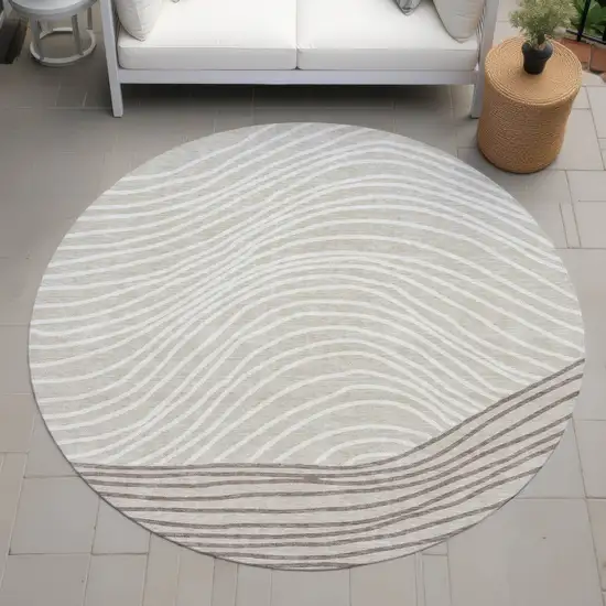 8' Beige Ivory And Brown Round Striped Washable Indoor Outdoor Area Rug Photo 7
