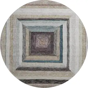 Photo of 8' Beige Ivory And Charcoal Geometric Washable Round Rug With UV Protection