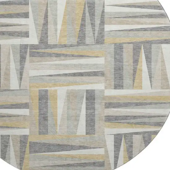 8' Beige Ivory And Gold Geometric Washable Round Rug With UV Protection Photo 2